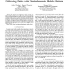 An image-based visual servoing scheme for following paths with nonholonomic mobile robots
