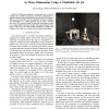 Automated manipulation of spherical objects in three dimensions using a gimbaled air jet