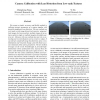 Camera Calibration with Lens Distortion from Low-rank Textures