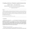 Counting solutions to binomial complete intersections
