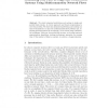 Minimizing Stall Time in Single and Parallel Disk Systems Using Multicommodity Network Flows