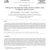 Solving the semi-desirable facility location problem using bi-objective particle swarm