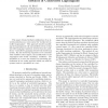 Stabilization of the Pendulum on a Rotor Arm by the Method of Controlled Lagrangians