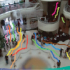 Tracking in Unstructured Crowded Scenes